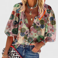 Lily | Lebendige und elegante Bluse mit langem Arm und floralem Muster