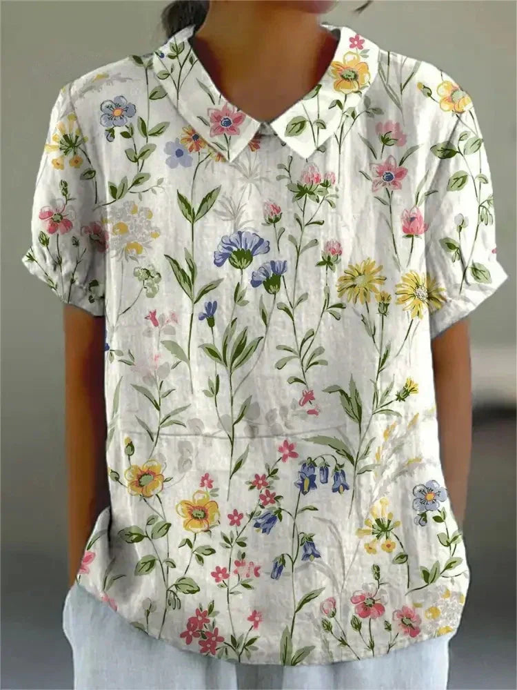 Charlotte | Playful vintage women's blouse with floral pattern 1
