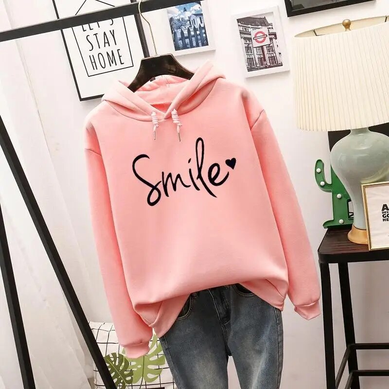 Ella | Cozy women's smile hoodie with statement print 1