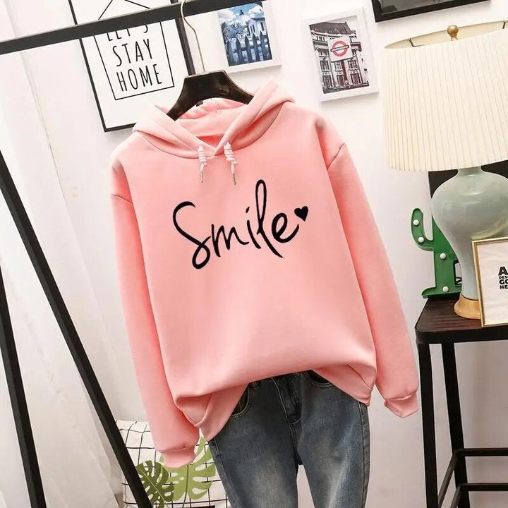 Ella | Cozy women's smile hoodie with statement print 1