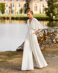 Zara | Tuta elegante e fluida con scollo a V e pantaloni a gamba larga