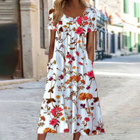Alice | Abito midi elegante a maniche corte con stampa botanica